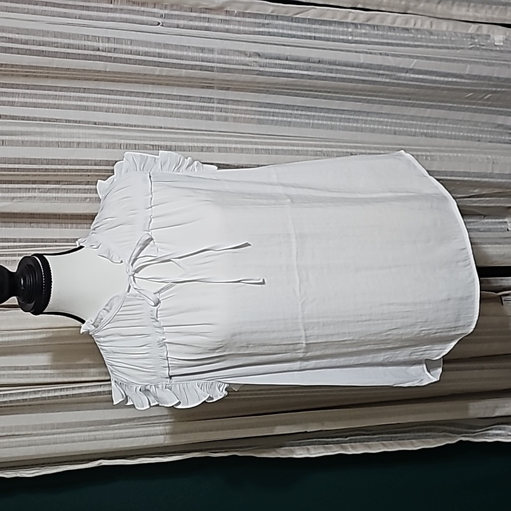 White sleeveless blouse